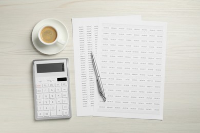 Photo of Calculator, documents, cup of coffee and pen on white wooden table, flat lay