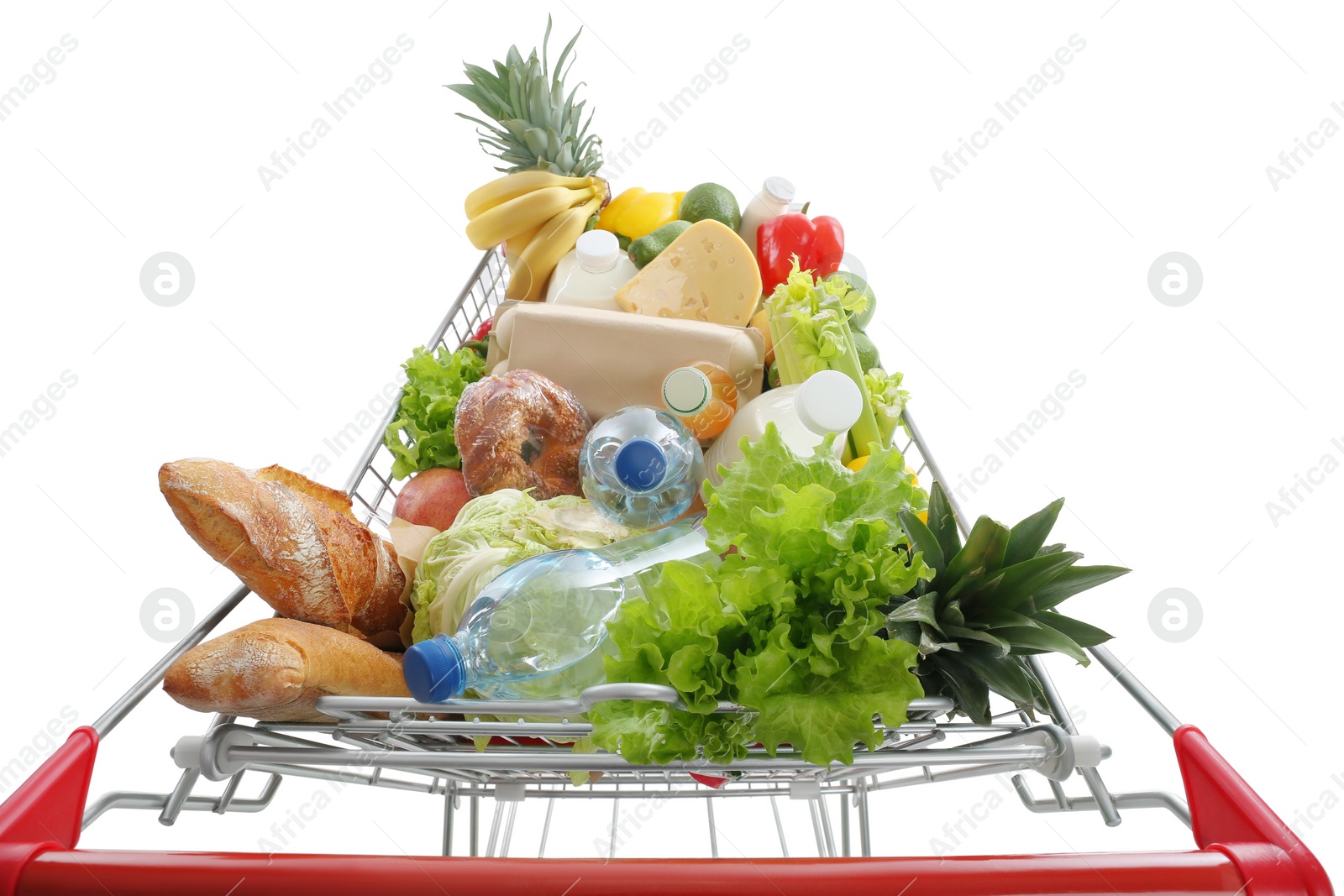 Photo of Shopping cart with groceries on white background, above view