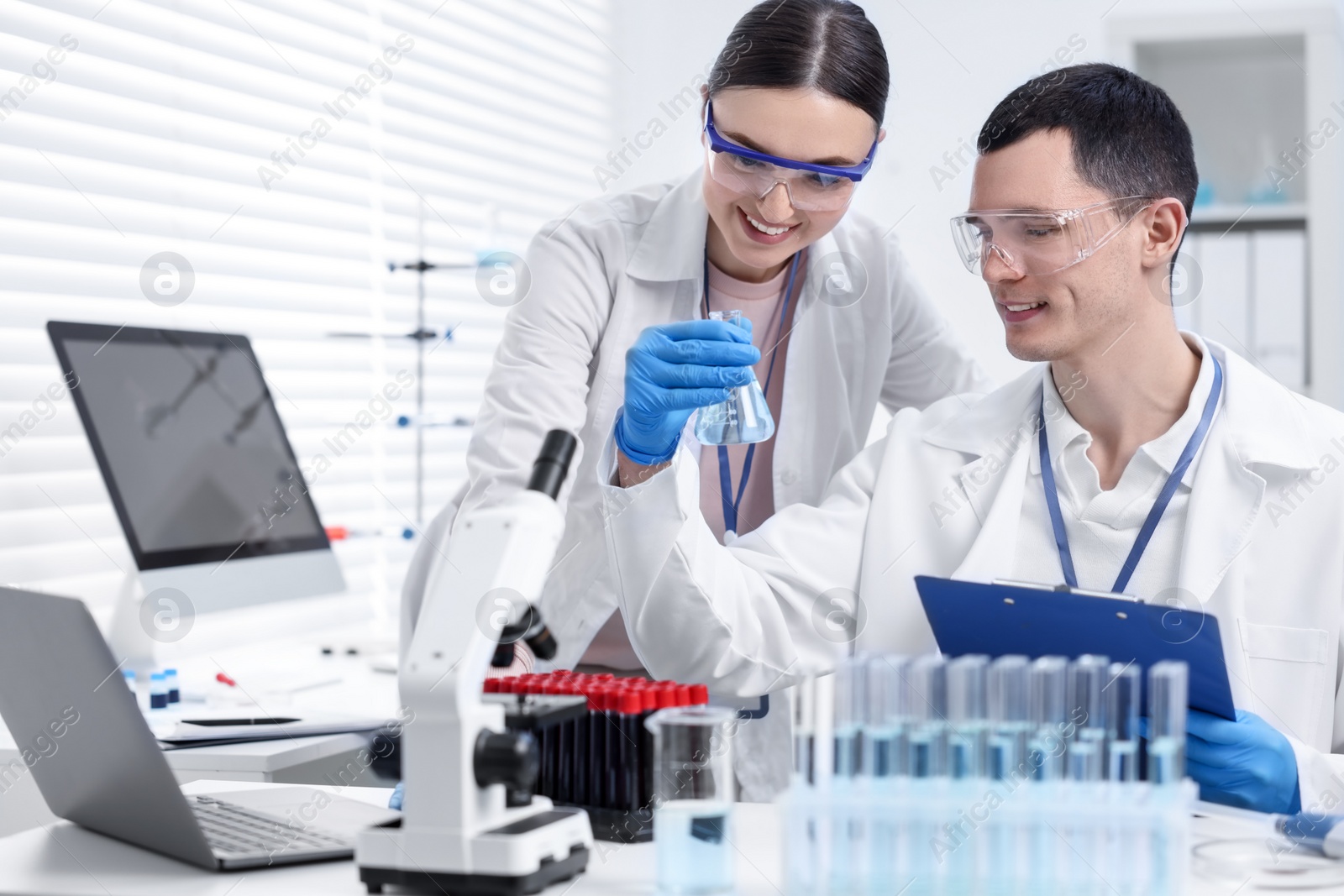 Photo of Scientists working with samples in laboratory. Medical research