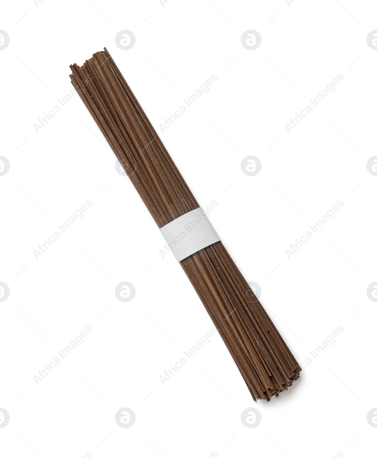 Photo of Uncooked buckwheat noodles (soba) isolated on white, top view