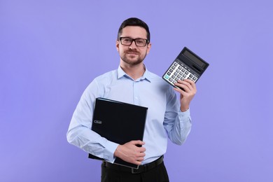 Photo of Happy accountant with calculator and folder on violet background
