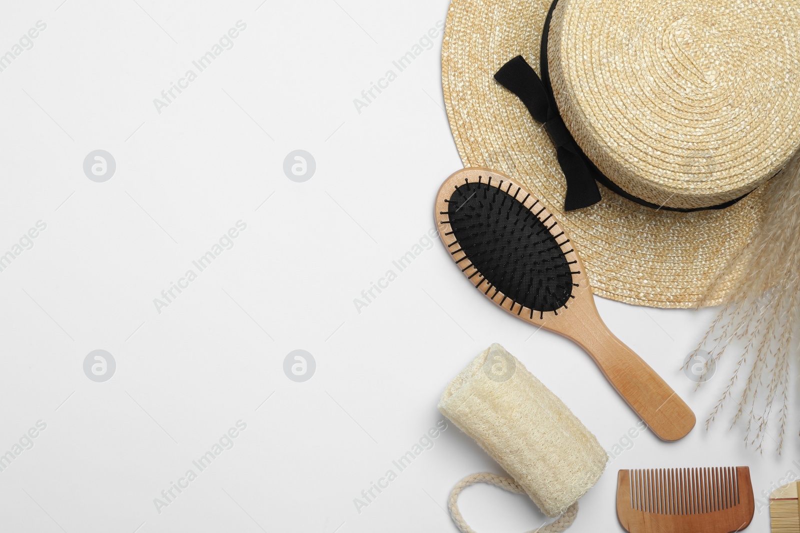 Photo of Composition with hair comb and brush on white background, top view