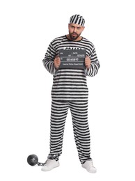 Photo of Prisoner in special uniform with mugshot letter board and metal ball on white background