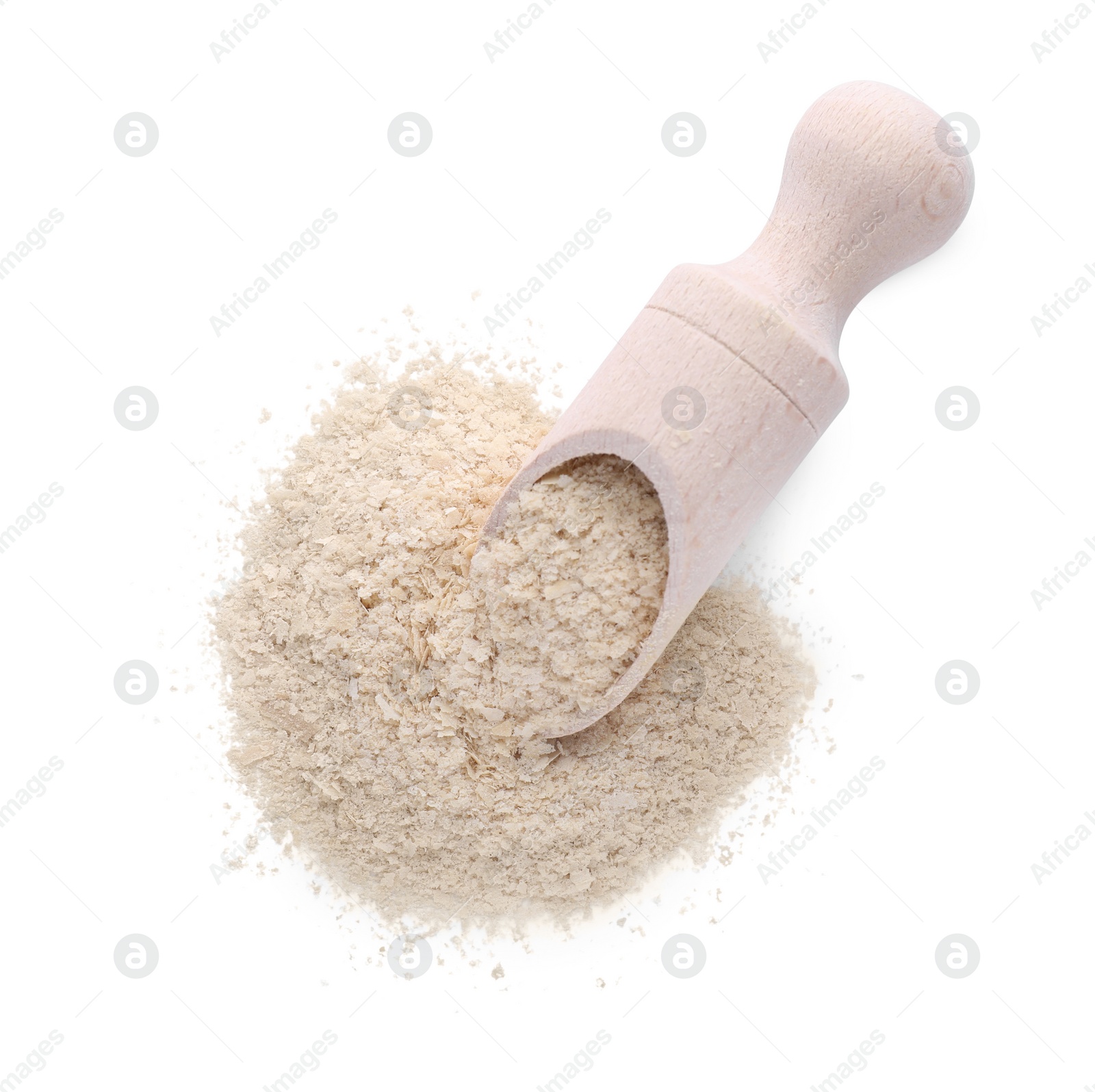 Photo of Brewer's yeast flakes and scoop isolated on white, top view