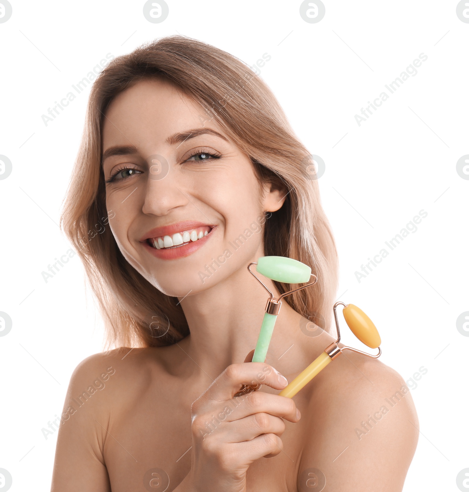 Photo of Young woman with natural face rollers on white background