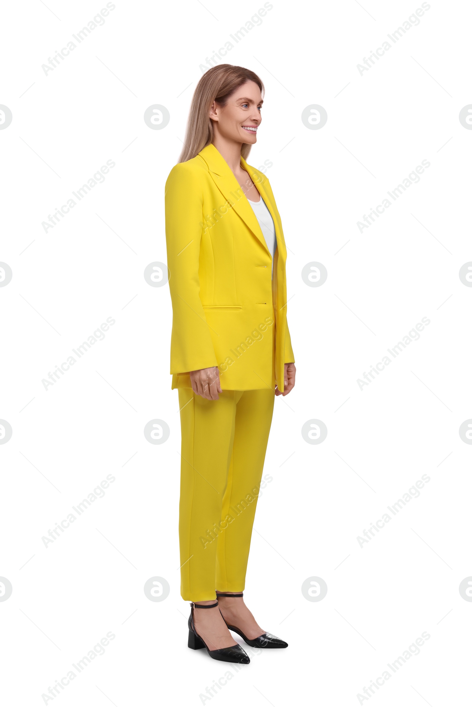 Photo of Beautiful happy businesswoman posing on white background