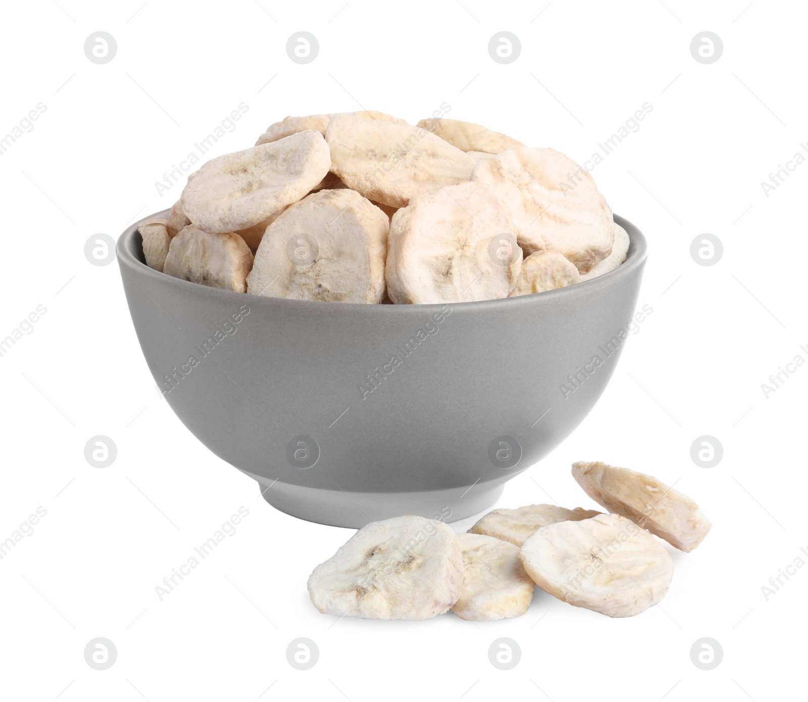 Photo of Freeze dried bananas in bowl on white background