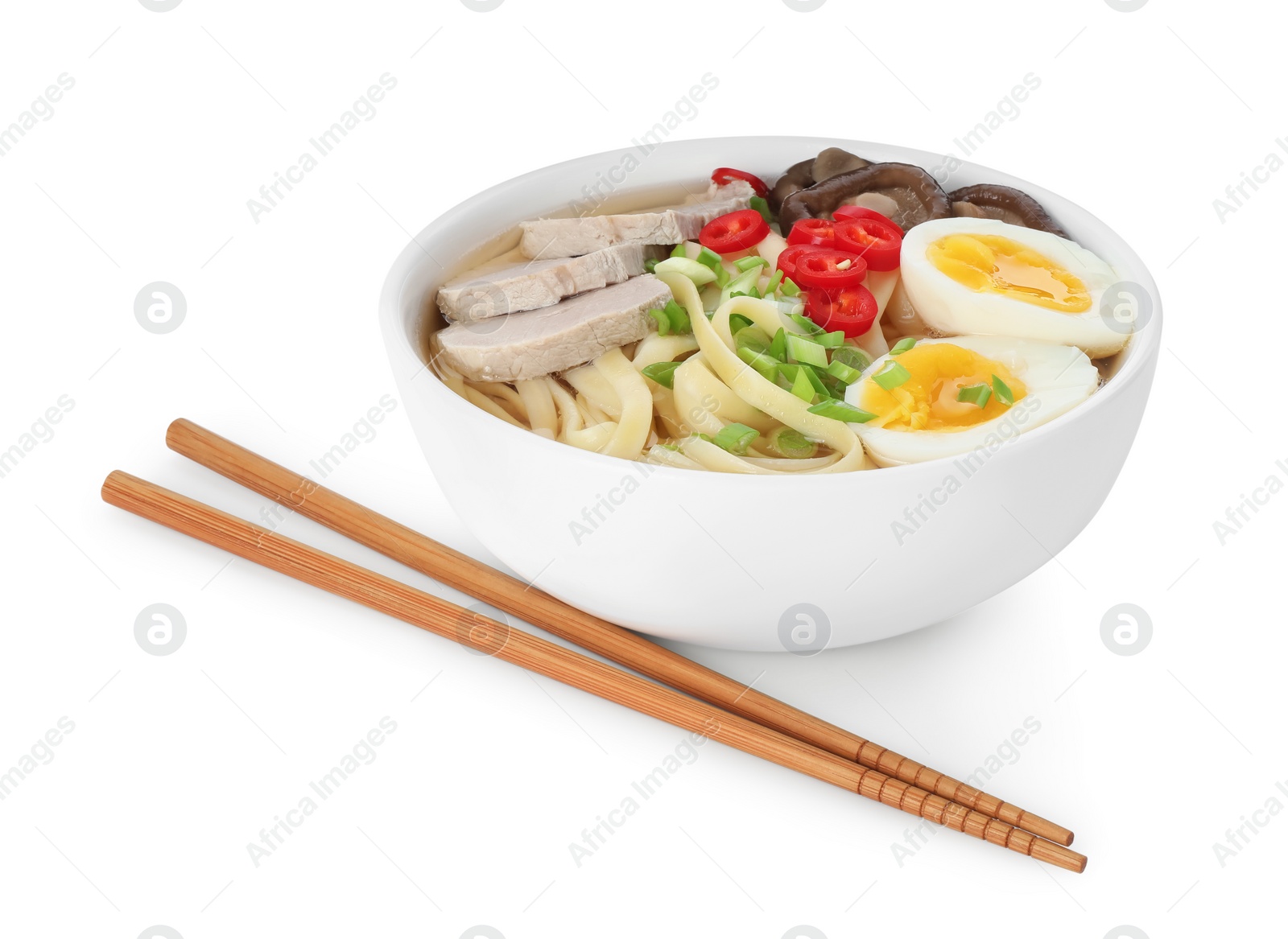 Photo of Delicious ramen with meat in bowl and chopsticks isolated on white. Noodle soup