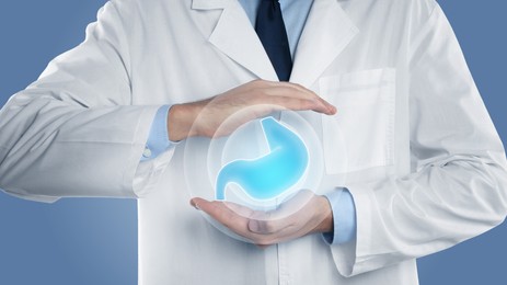 Symptoms and treatment of heartburn and other gastrointestinal diseases. Doctor holding stomach illustration on blue background, closeup