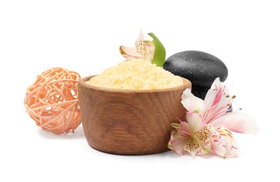 Orange sea salt in bowl, spa stones, rattan ball and floral decor isolated on white