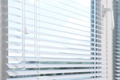 Photo of Window with horizontal blinds indoors, closeup view