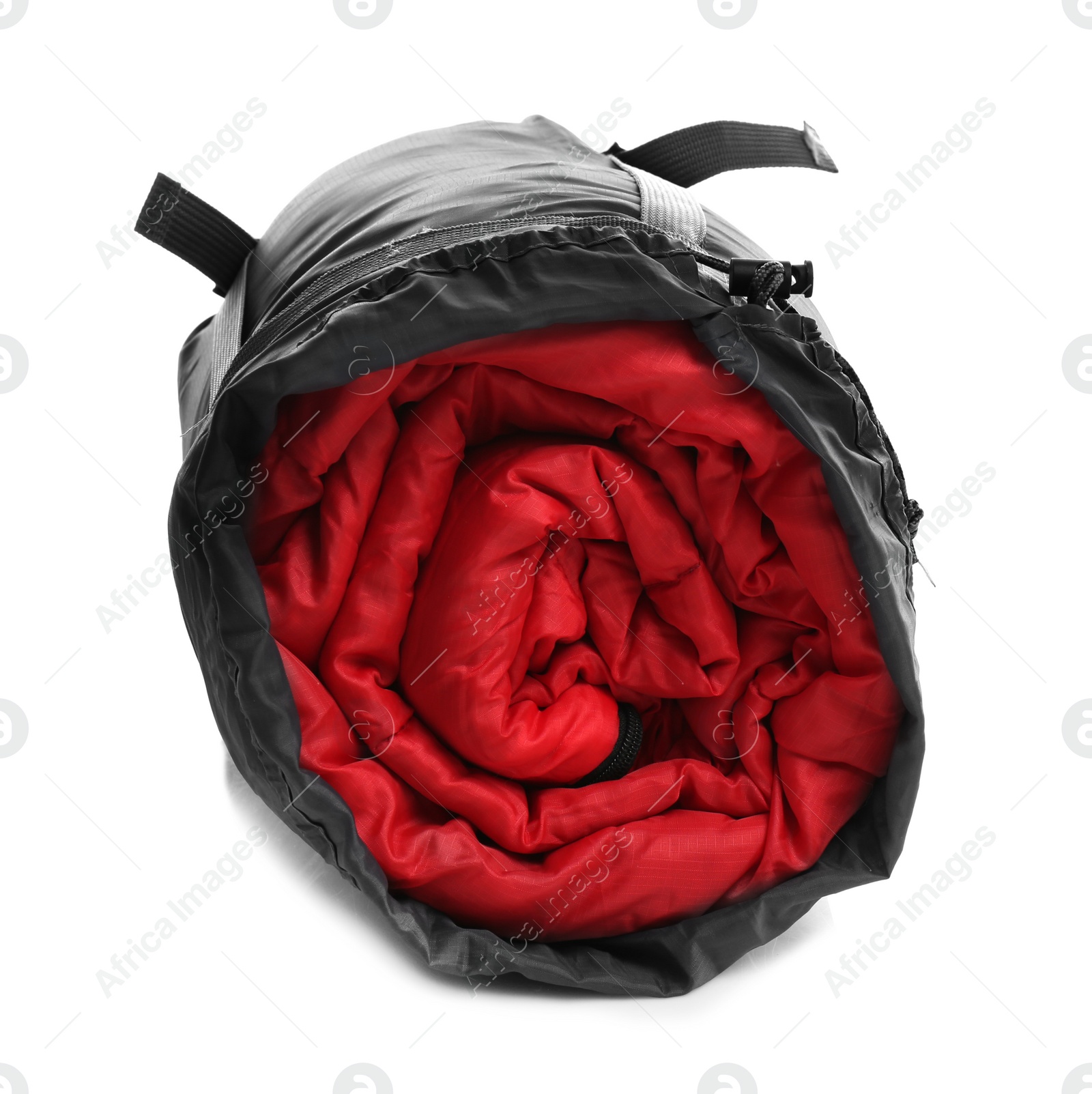 Photo of Sleeping bag in case on white background. Camping equipment