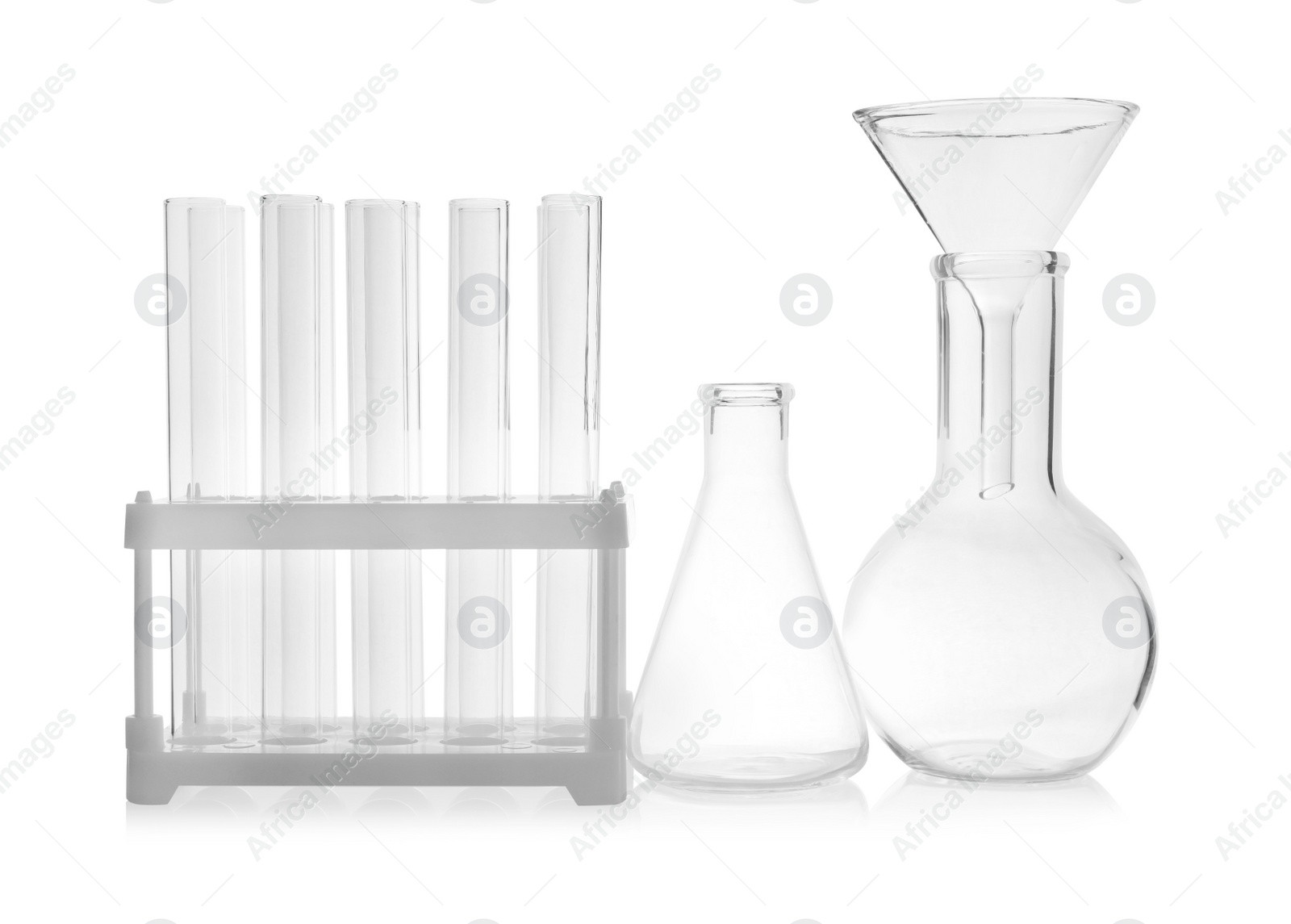 Photo of Set of laboratory glassware on white background