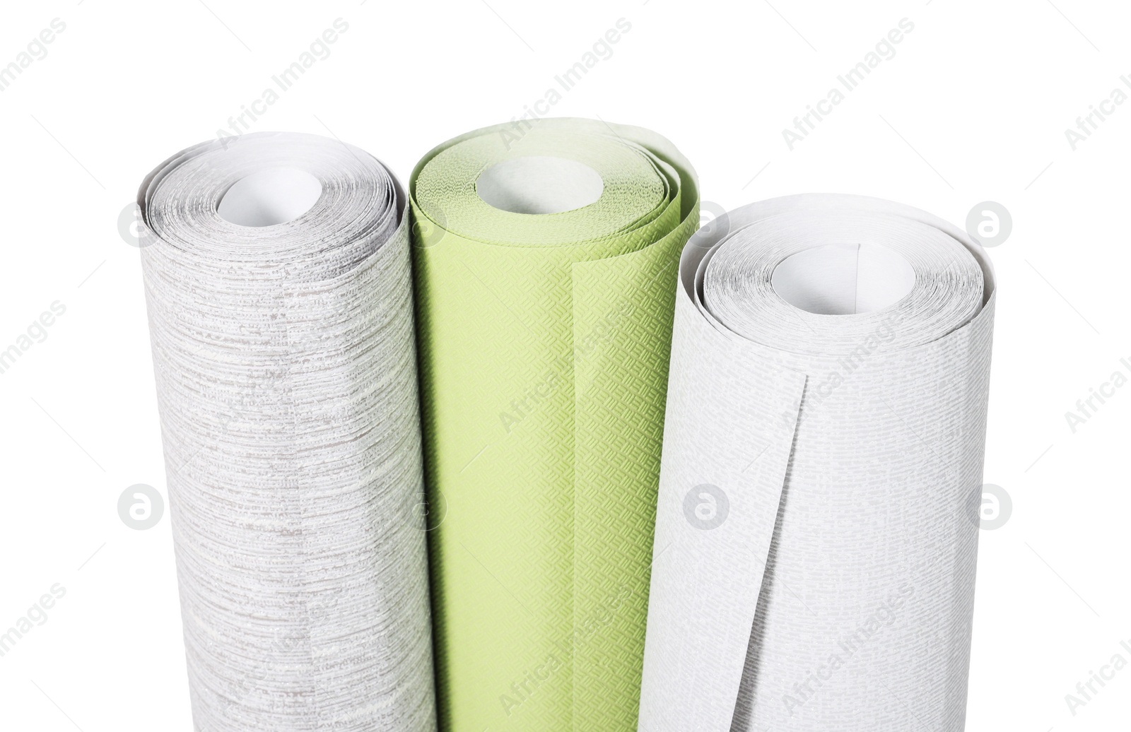 Photo of Three different wallpaper rolls isolated on white