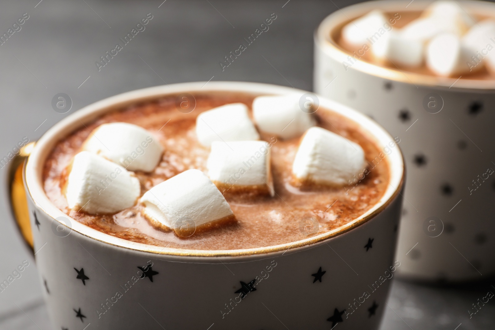 Photo of Cup of delicious hot cocoa with marshmallows, closeup