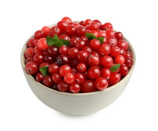 Photo of Bowl of fresh ripe cranberries with leaves isolated on white