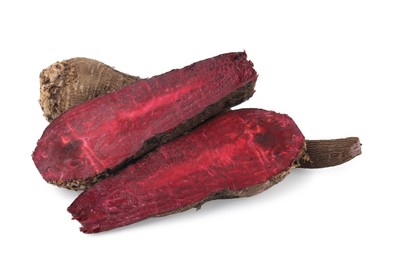 Whole and cut red beets isolated on white