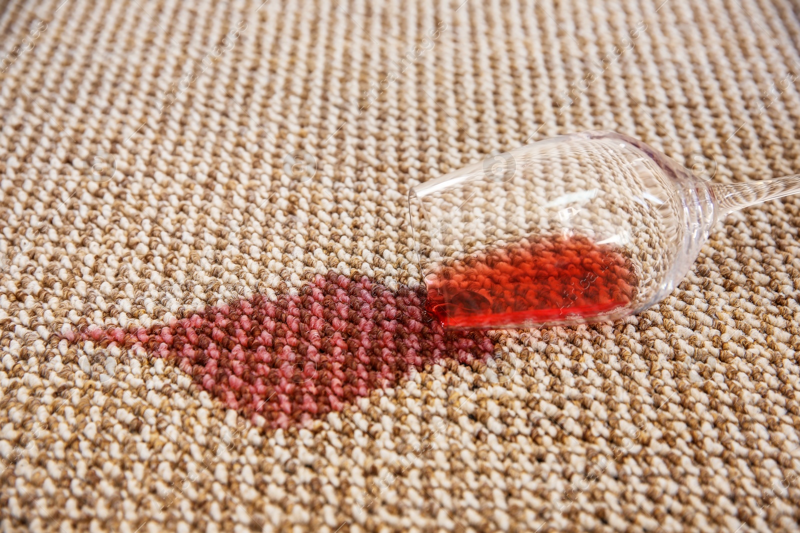 Photo of Spilled red wine on carpet