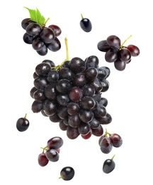 Image of Fresh ripe grapes falling on white background