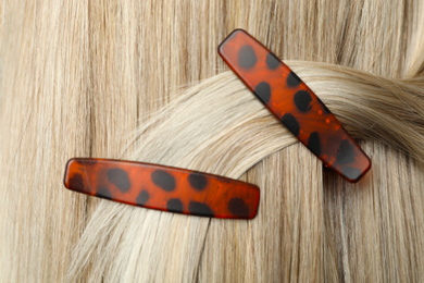 Photo of Woman with beautiful hair clips, closeup view