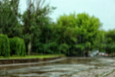 Blurred view of city street on rainy day