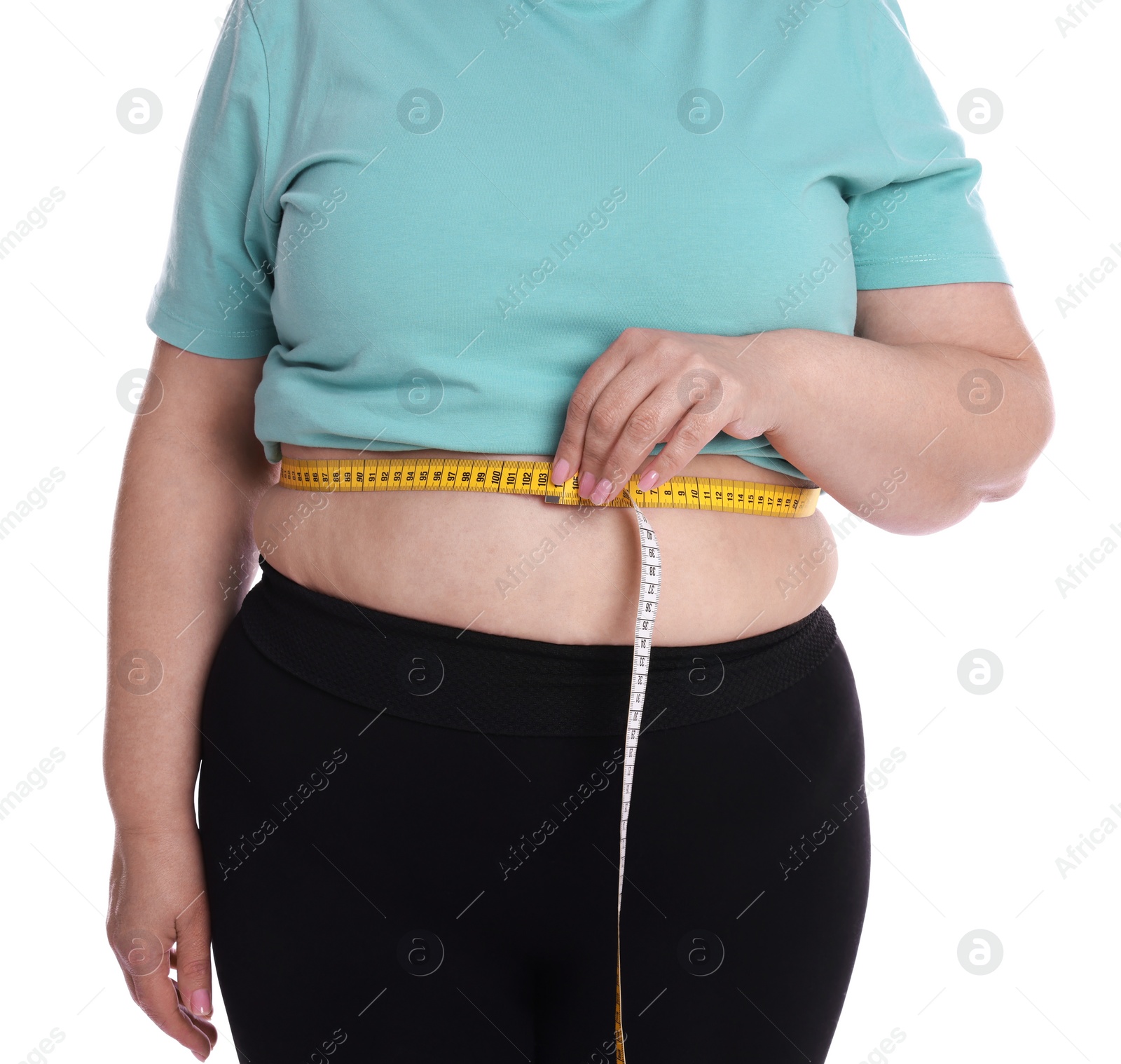 Photo of Overweight woman measuring waist with tape on white background, closeup