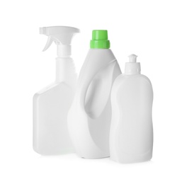 Photo of Bottles of different cleaning products on white background