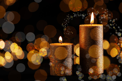 Image of Burning candles on dark background, bokeh effect