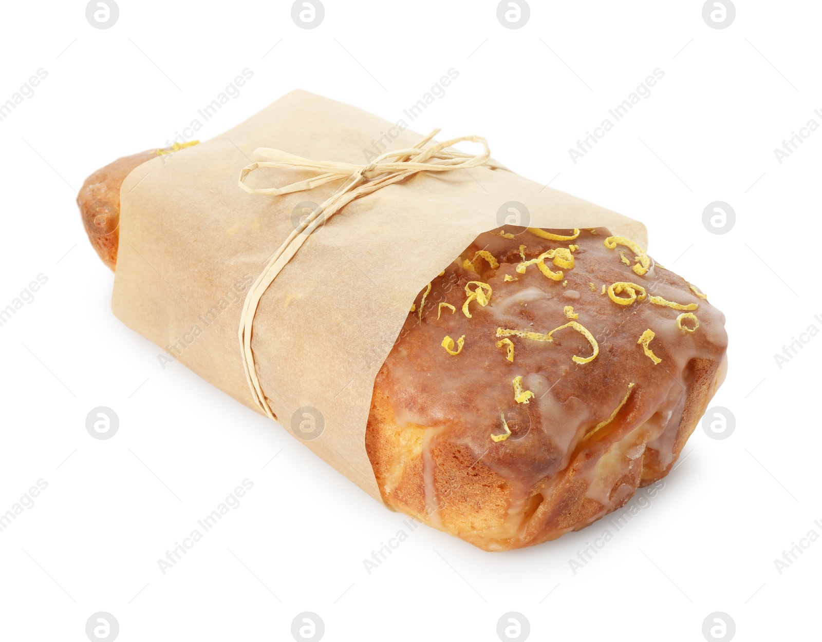 Photo of Wrapped tasty lemon cake with glaze isolated on white