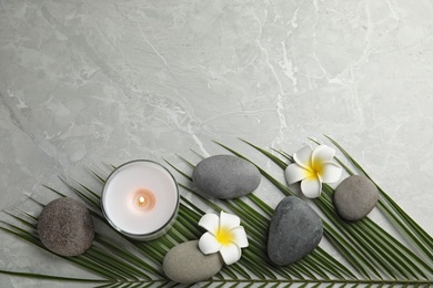 Photo of Flat lay composition with stones on grey marble background, space for text. Zen concept