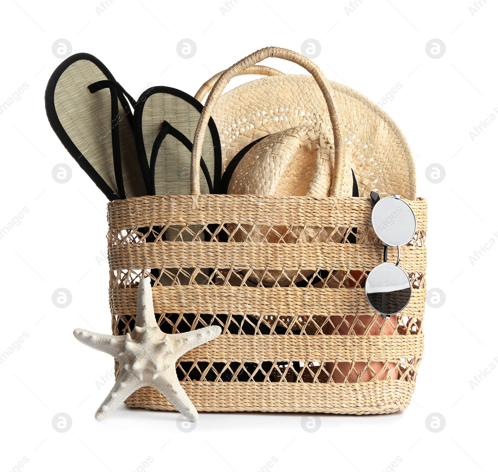 Photo of Set of beach accessories on white background