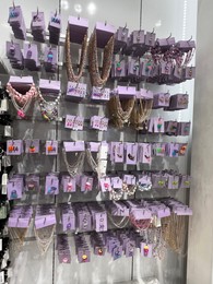 WARSAW, POLAND - JULY 17, 2022: Fashion store display with different jewelry in shopping mall