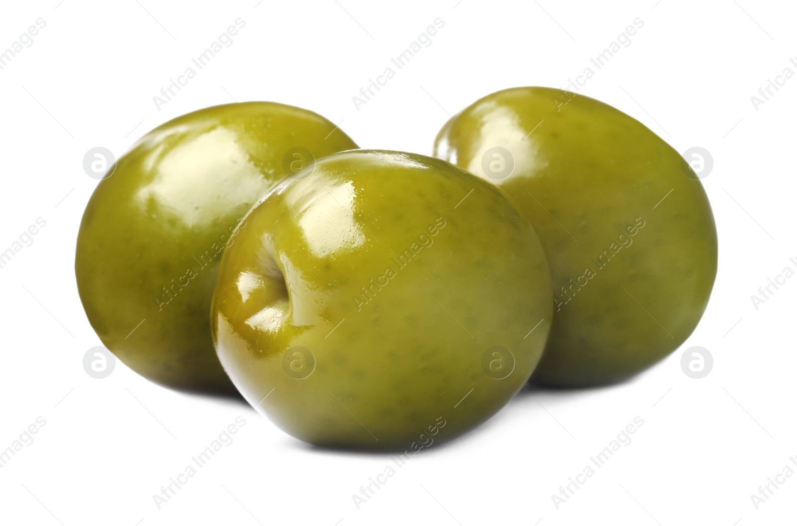 Photo of Three fresh green olives on white background