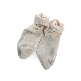 Pair of dirty socks on white background, top view