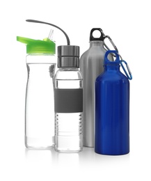 Photo of Different water bottles for sports on white background