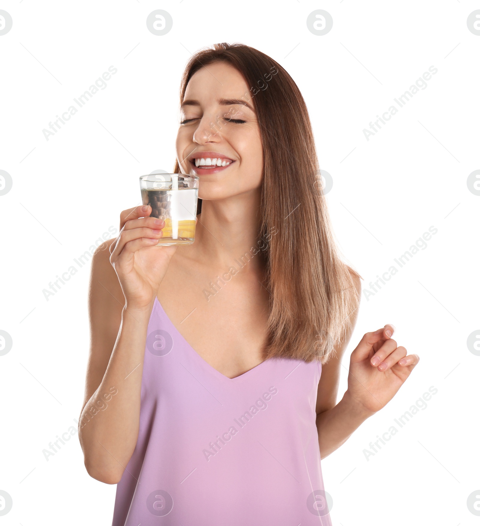 Photo of Young woman drinking lemon water on white background