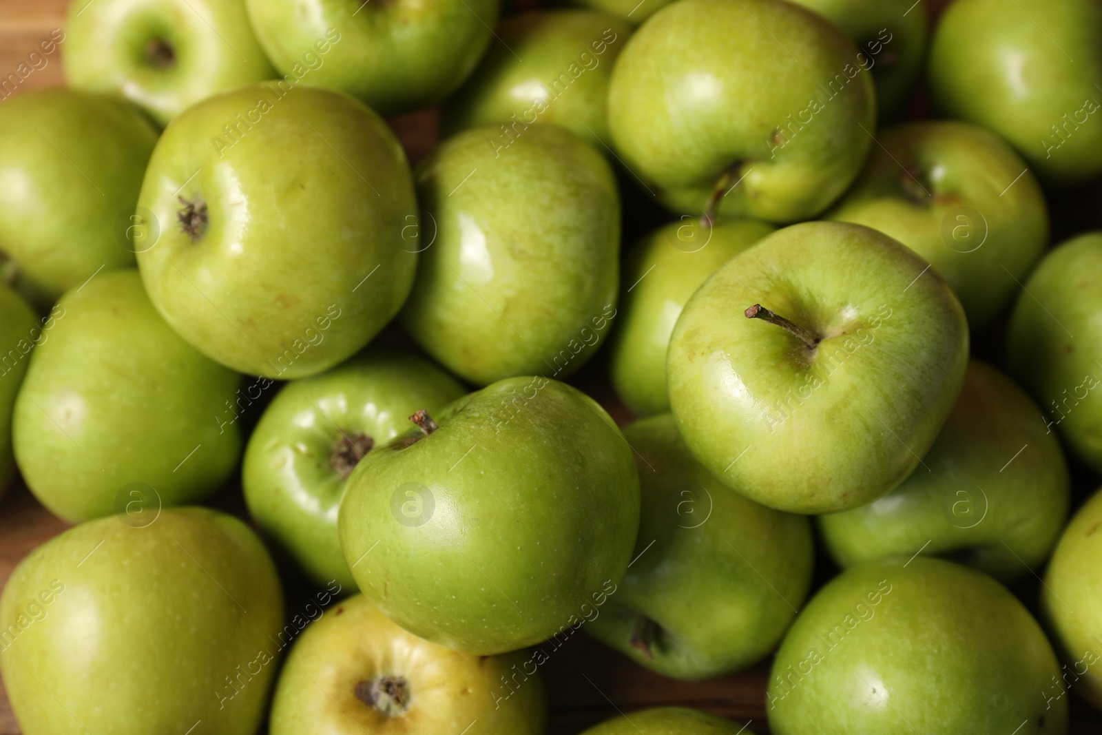 Photo of Fresh ripe green apples as background, closeup