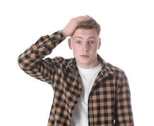 Portrait of emotional teenage boy on white background