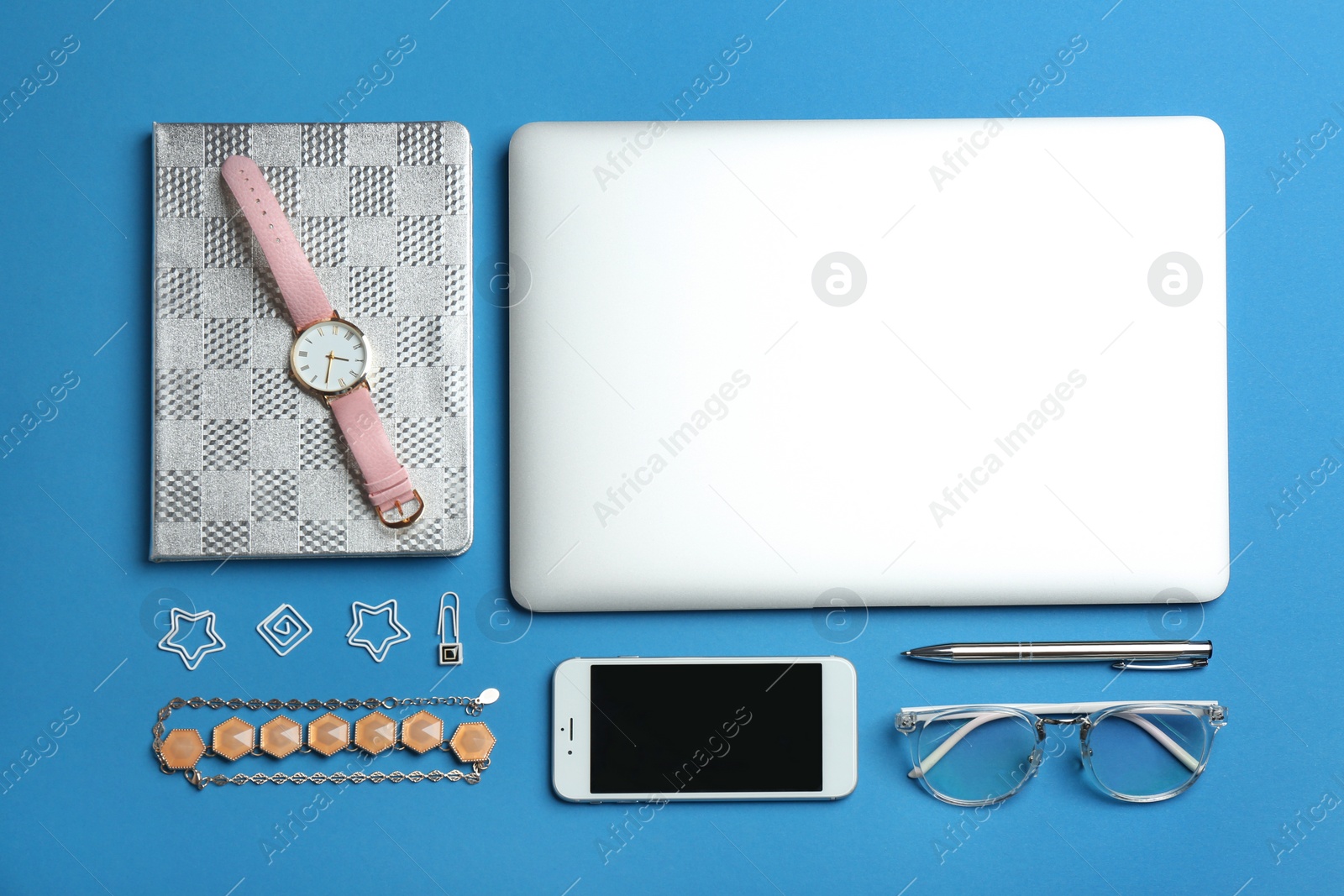 Photo of Flat lay composition with laptop, smartphone and accessories on color background. Fashion blogger