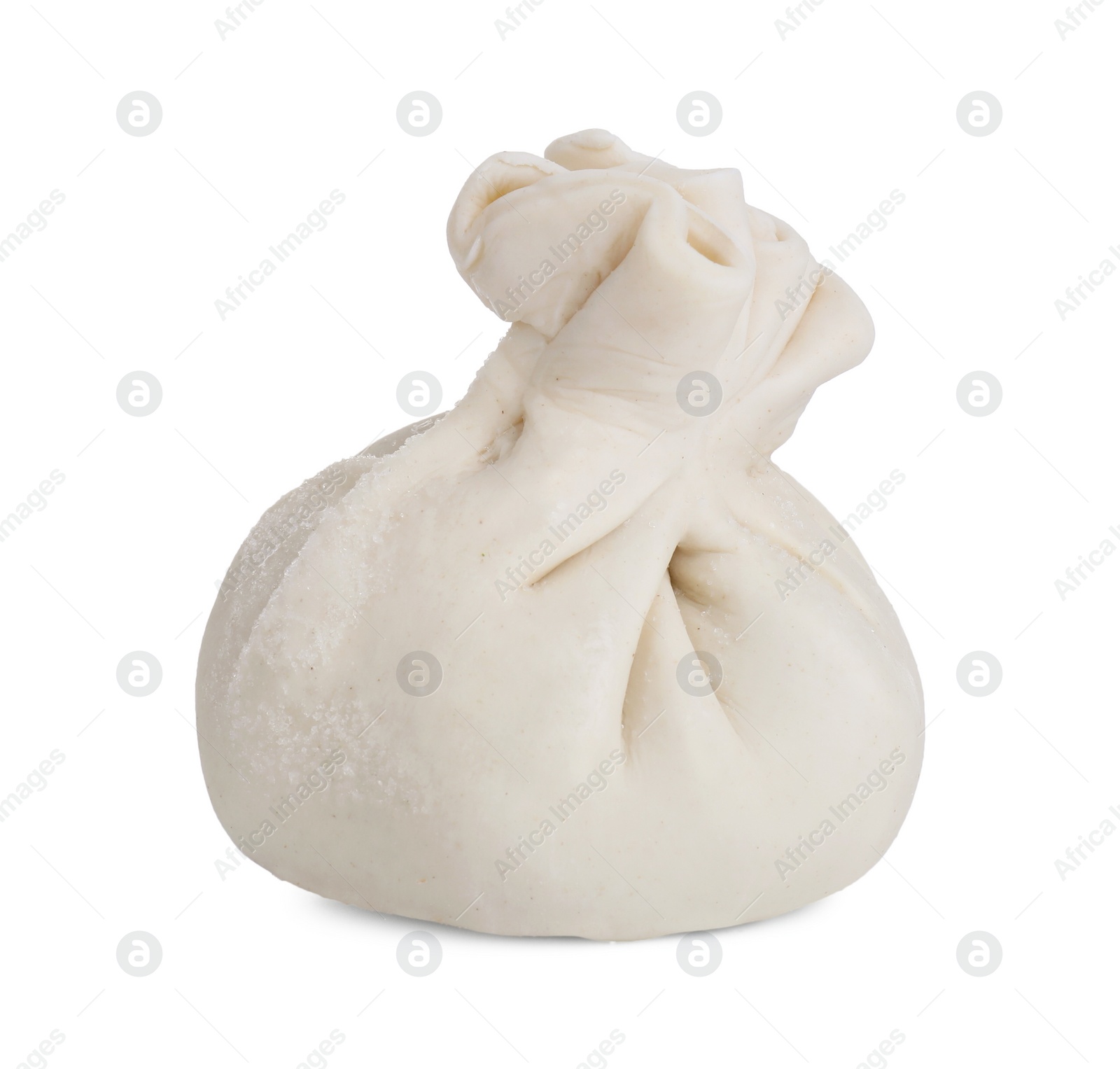 Photo of Uncooked khinkali (dumpling) isolated on white. Georgian cuisine