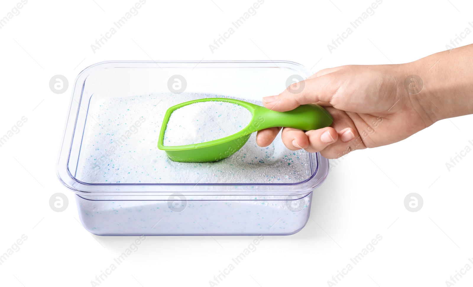 Photo of Woman holding scoop of laundry powder over container isolated on white, closeup