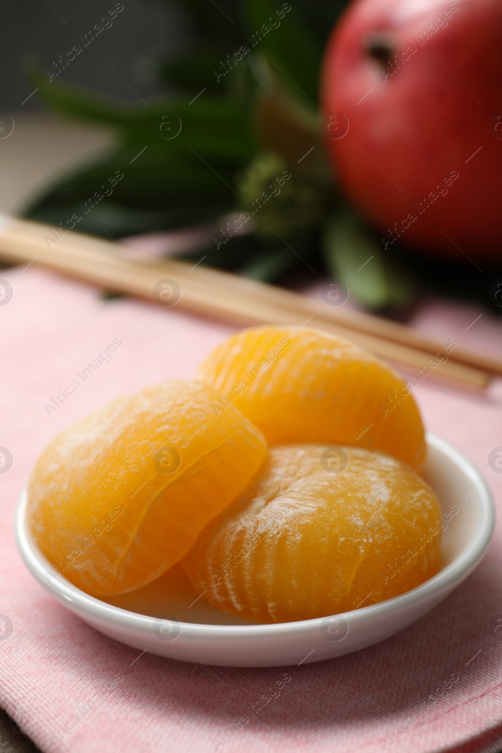 Photo of Plate with delicious mochi on table, closeup. Traditional Japanese dessert