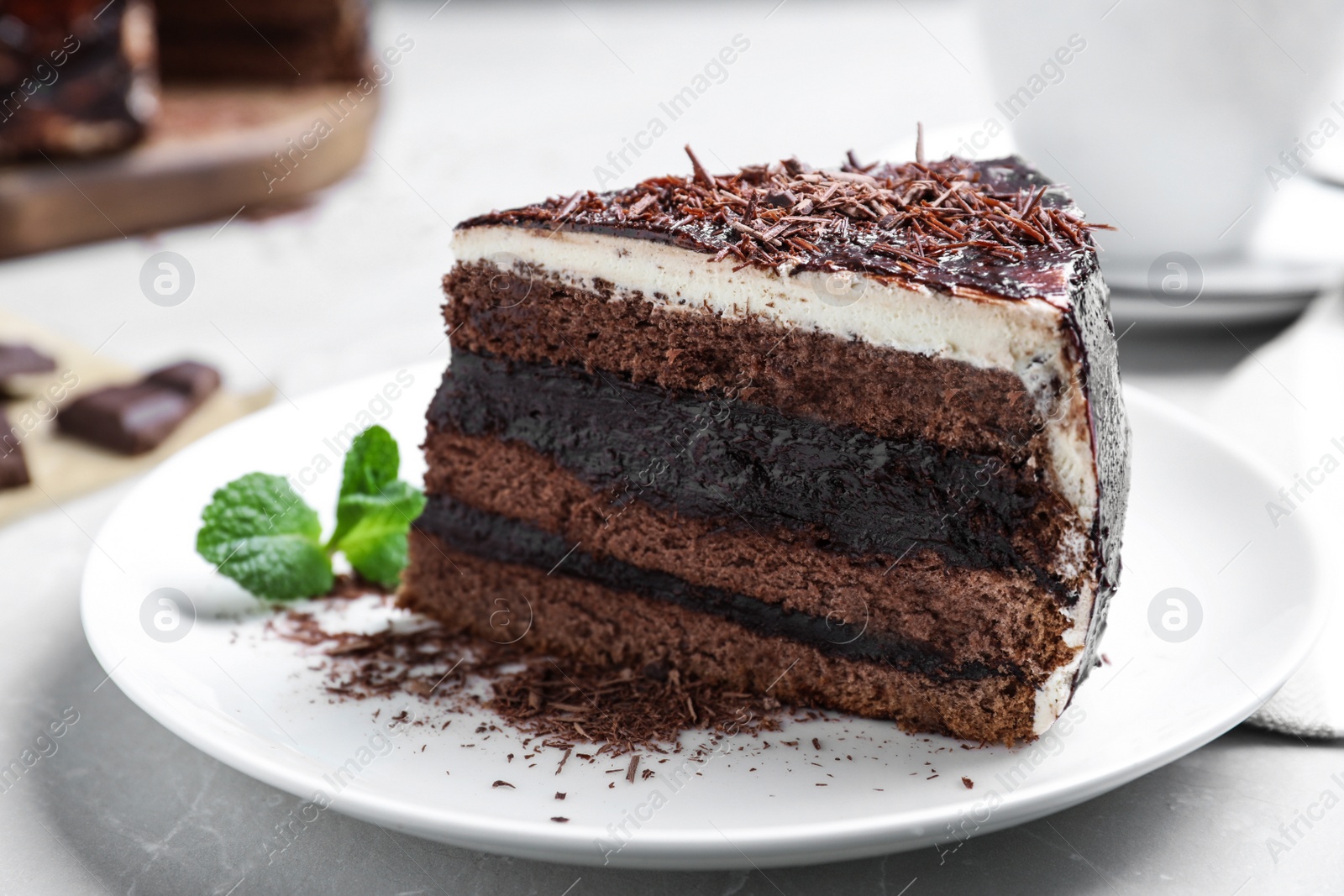 Photo of Tasty chocolate cake served on table, closeup