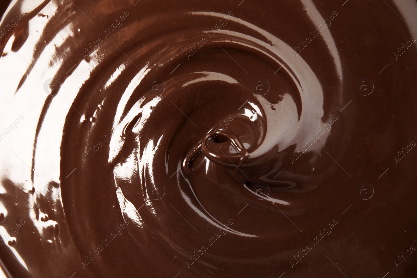 Photo of Sweet tasty chocolate cream as background, closeup