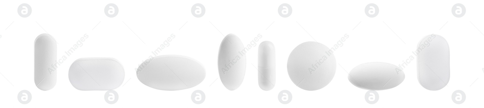 Image of Set of different pills in row isolated on white