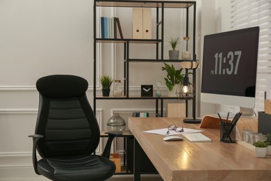 Photo of Home office interior with comfortable workplace near window