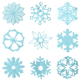 Image of Set of beautiful paper snowflakes on white background