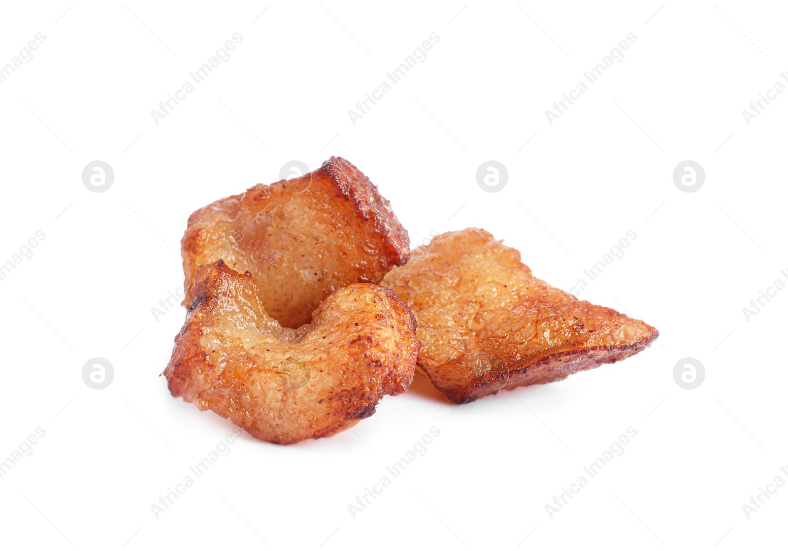 Photo of Tasty fried cracklings on white background. Cooked pork lard