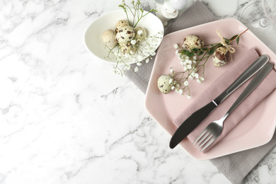 Photo of Festive Easter table setting with beautiful floral decor, flat lay. Space for text