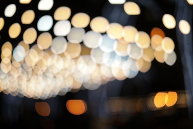 Photo of Beautiful street lights at night. Bokeh effect